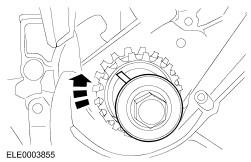 Page 13 of 39 37. Remove the crankshaft pulley bolt and washer, while maintaining the 11 o'clock crankshaft keyway position. 38.
