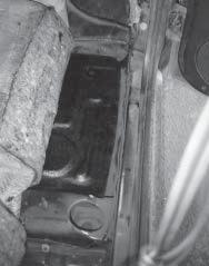 Remove sound deadening from the mounting area. 19. Place the main hoop into position.