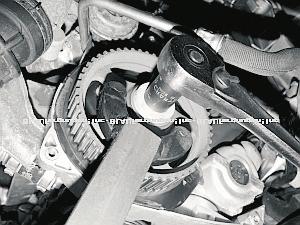 (Image 10) 14) Using cam sprocket puller tool T40001 pop cam sprocket off as this is a tapered shaft and remove sprocket. (Image 11) 15) Remove cam seal by using cam seal tool 2085.