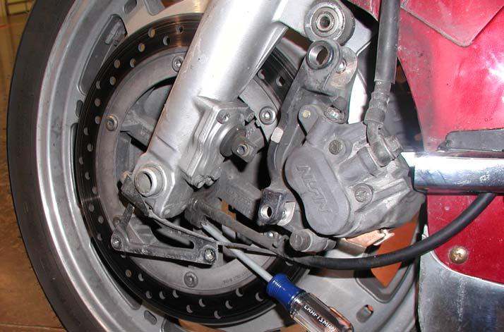 Figure 11: Removing Front Wheel Speed Sensor 13.