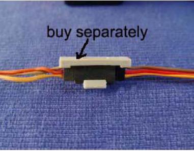 Remove the covering from the servo  Put the servo into the
