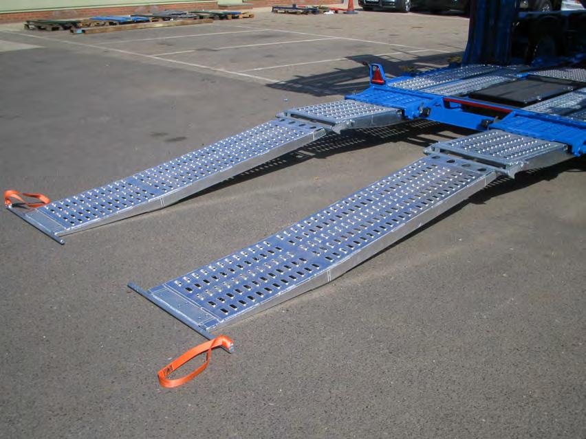Half Powered Loading Ramps Fully extend the hydraulic loading ramps.