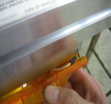 light bracket using a Philips screwdriver.