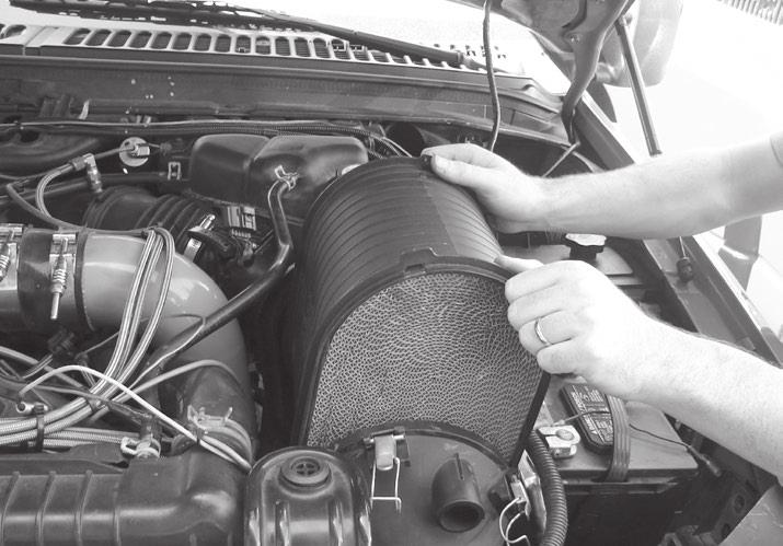 Figure 5 7. Remove the front air cover by withdrawing and lifting out of engine bay. 8. Remove the rear air cover.