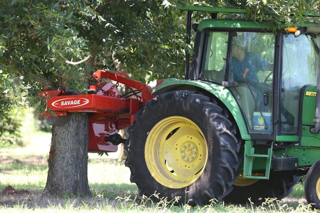 PTO trunk shaker is used to vibrate nuts off the tree for crop load