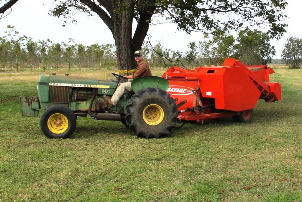 Mechanical harvester uses rubber fingers to sweep nuts