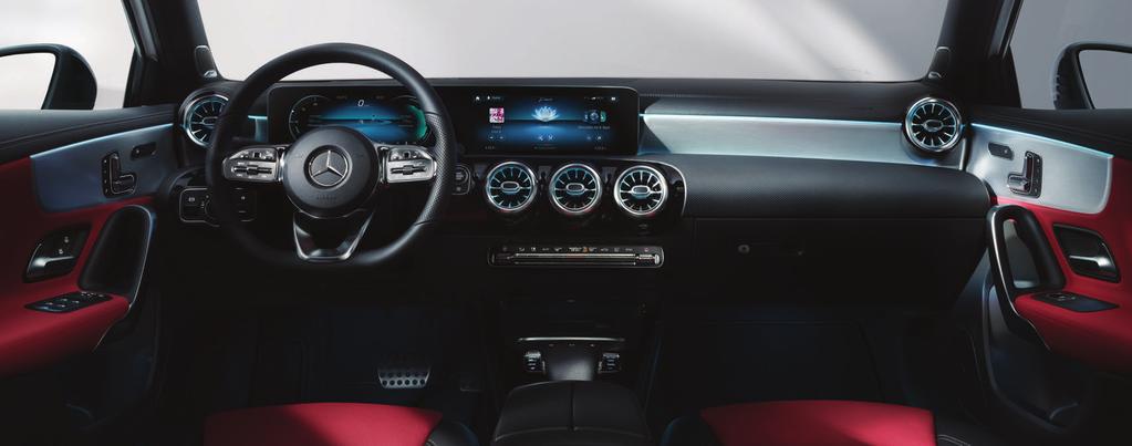 Wrap-around effect. The interior of the new A-Class literally embraces the occupants. Smooth transitions between instrument panel, centre console and door trims create the pleasant wrap-around effect.