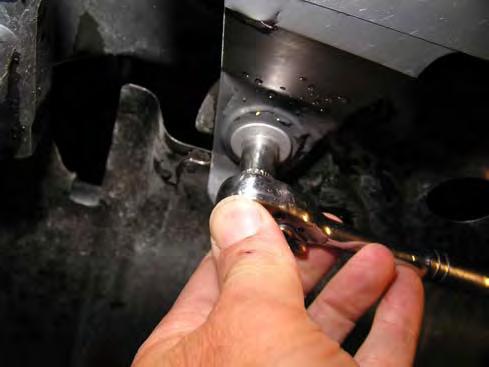 Remove lower bumper retaining screws. 4.