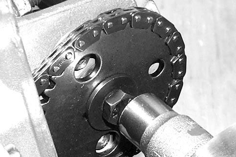 Subsection 08 (CYLINDER AND HEAD) CAMSHAFT TIMING GEAR Removal Lock crankshaft at the TDC compression position, refer to CRANKSHAFT. Remove: valve cover chain tensioner chain guide no. bolt no.