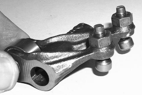 Subsection 08 (CYLINDER AND HEAD) Inspection Rocker Arm Inspect each rocker arm for cracks and scored friction surfaces. If so, replace rocker arm assembly.