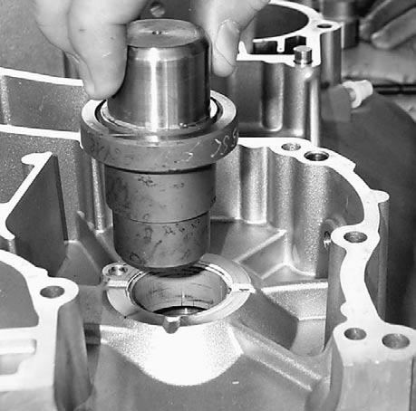 Crankcase housing damages may occur if this procedure is not performed correctly. NOTE: Always use a press for removal or installation of plain bearing halves.