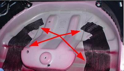 Remove the tail lamps. Refer to Tail Lamp Replacement in SI and reseal the sheet metal seam.
