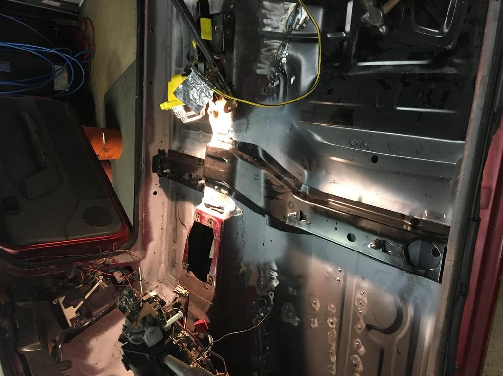 Plug welds along vehicle sub frame; lap welds along transmission tunnel New floor pan seat brace Bottom flange Figure #9 24.