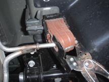 Remove the panels from behind the rear wheels by removing () hex nuts using a 0mm socket