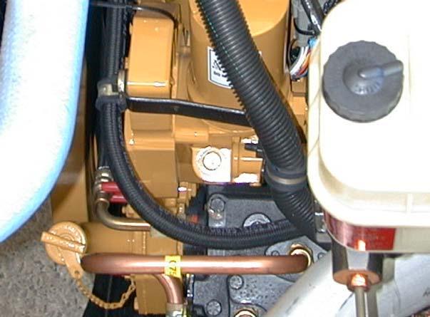 compressor housing. This housing is located on the front driver side of the engine block. These connectors are illustrated in the photographs below.