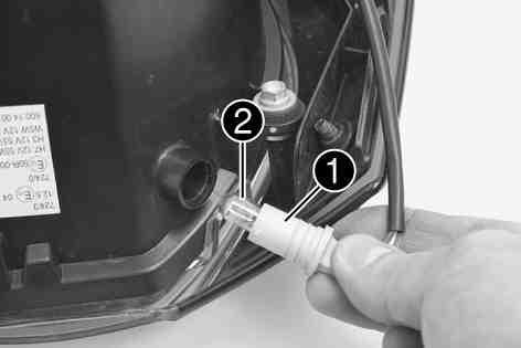 ELECTRICAL SYSTEM 137 Pull socket out of the headlight and pull bulb out of the socket. Insert the new bulb into the socket and insert the socket into the headlight. Parking light (W5W / socket W2.