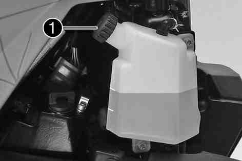 COOLING SYSTEM 148 Only remove the right side cover. Park the motorcycle upright on a horizontal surface. Remove cap of the compensating tank. Check the coolant antifreeze.