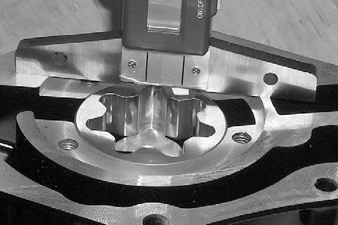 Pittings on the teeth Using a feeler gauge, measure the clearance between inner and outer rotors. R503motr39A. Oil pump housing surface.