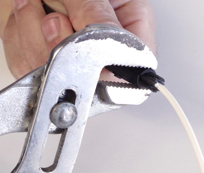 Installation Manual Step 7: Use pliers (as shown) to pinch