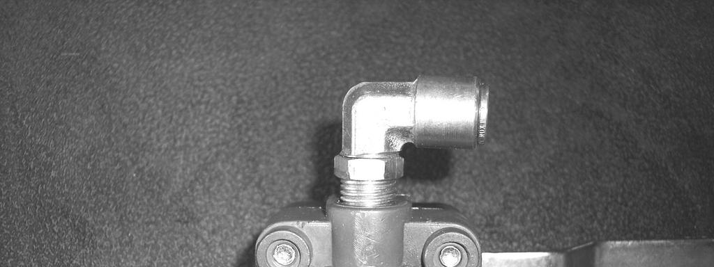 Attach fittings to leveling valve