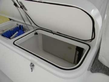 Aft Cockpit Custom L-shaped bench seat 5 flush mount rod holders removable Lockable rod storage port &