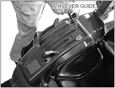 Remove the RH lever guide by
