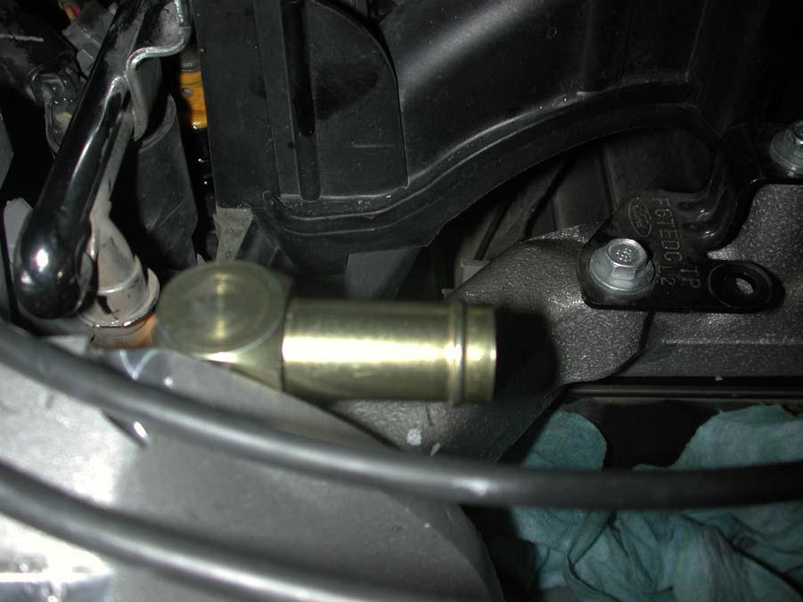 90 degree hose barb Intake Manifold Figure 1.3 Installing the fitting 3.