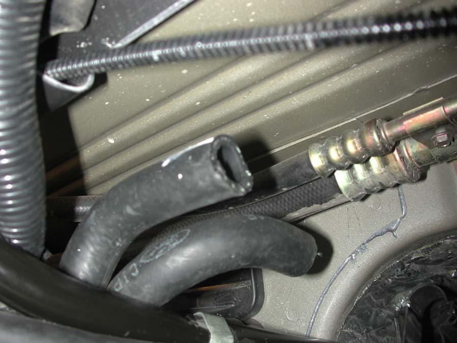 Figure 1.9 Hoses after cutting 1.2.5 Engine Oil Fill Tube 1. Remove the engine oil fill tube. 2. Cut 1-3/4 from the engine end of the tube. 1.3 Preparing for Installation 1.