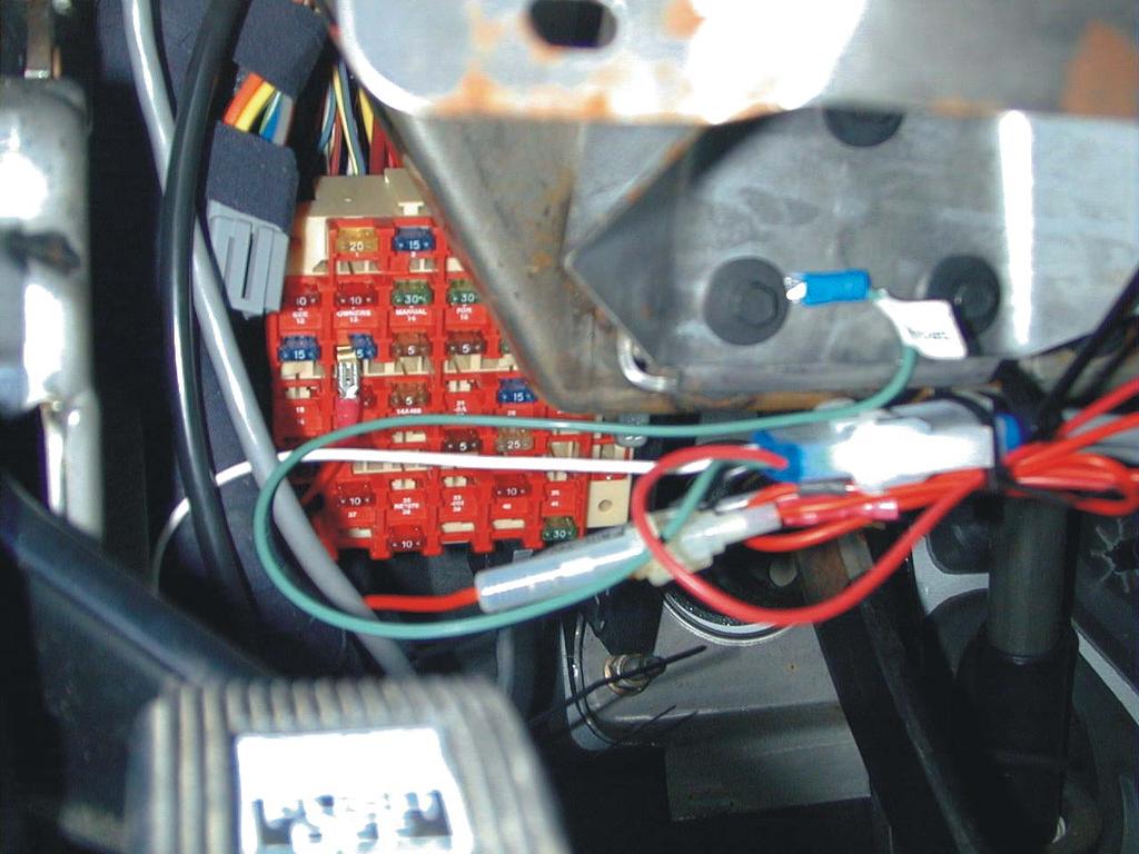 7. Route the red Key-switched 12 Volts wire with the inline fuse to the fuse panel under the dash.