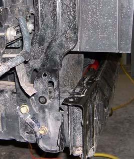 Position front bumper on front bumper brackets and visually inspect and the frame