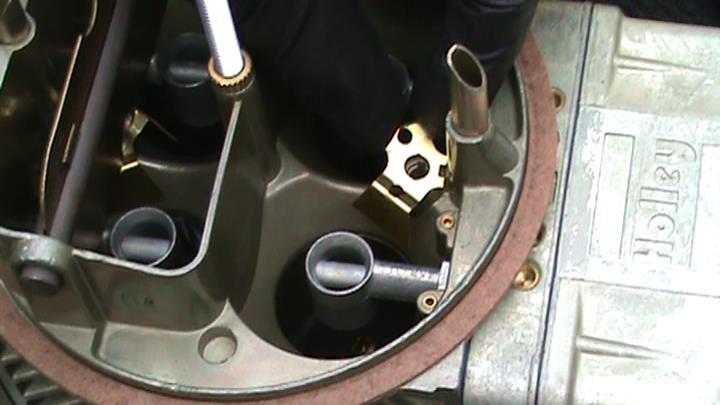 12. Installation is similar for the rear accelerator discharge nozzle on mechanical secondary 4 BBL carburetors.