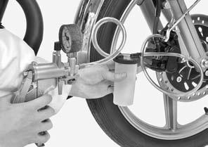 Loosen the bleed valve and pump the brake lever until no more fluid flows out of the bleed valve. Tighten the bleed valve. BLEED HOSE Follow the manufacturer s operating instructions.