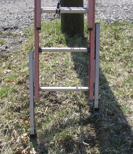 It is very common in our area to need to setup a ladder on uneven terrain. Shown below are two examples of using a ladder with automatic levelers.