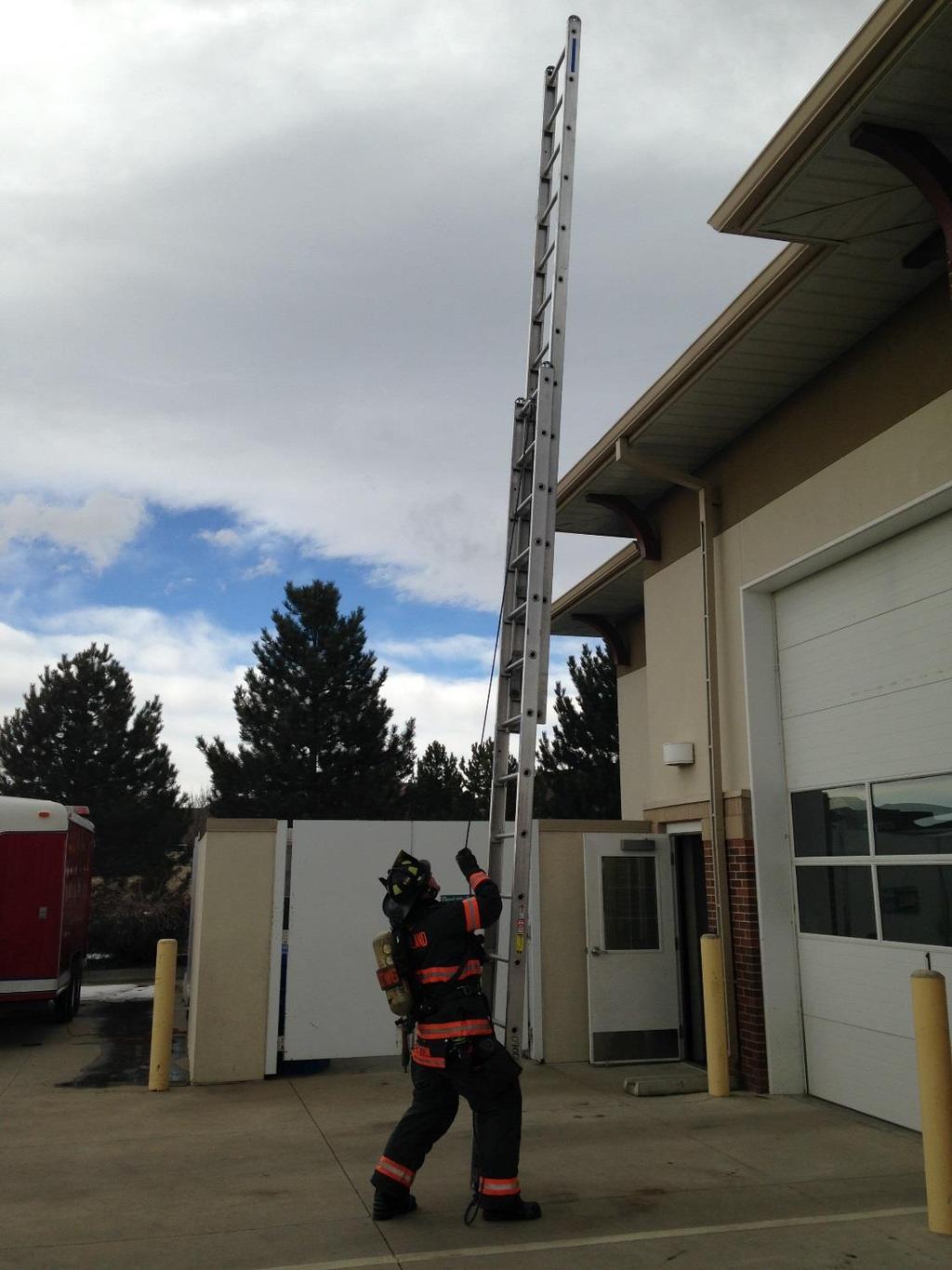 #5 Use a controlled hand over hand method to extend the ladder to the proper height (3-5 rungs above the roof line).