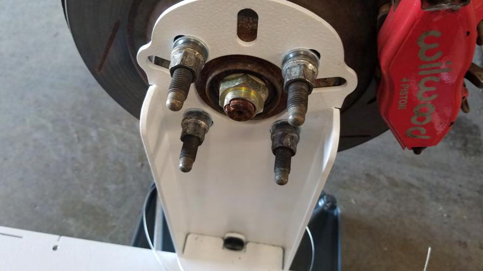 Raise the car, remove the wheels, and install the Hub Stands as shown, being sure to use the included lug washers between your lug nuts/bolts and the Hub Plate surface.