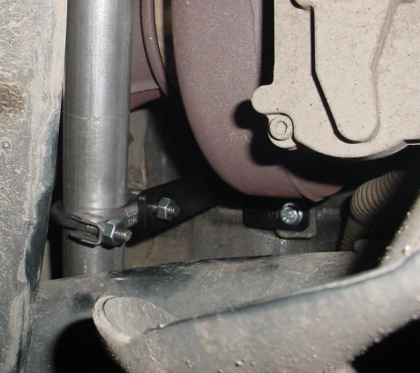 8) Install the downpipe using the supplied V- band clamp. Tighten the clamp just enough to support the downpipe without touching the turbo.