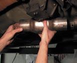 Install straight pipe or catalytic converter onto the double barrel.