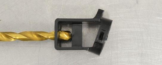 Drill out the hole in the bracket with an 11/32 drill bit (shown in the #2a photo), drilling