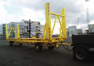 electric hydraulically operated clamps as mounted at the front and rear of the platform frame.