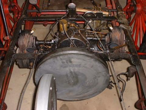 The 1905 Sears Auto Buggy uses a variable speed friction drive. It has an aluminum disc mounted on the face of the flywheel at the end of the crankshaft that rotates at engine rpm.