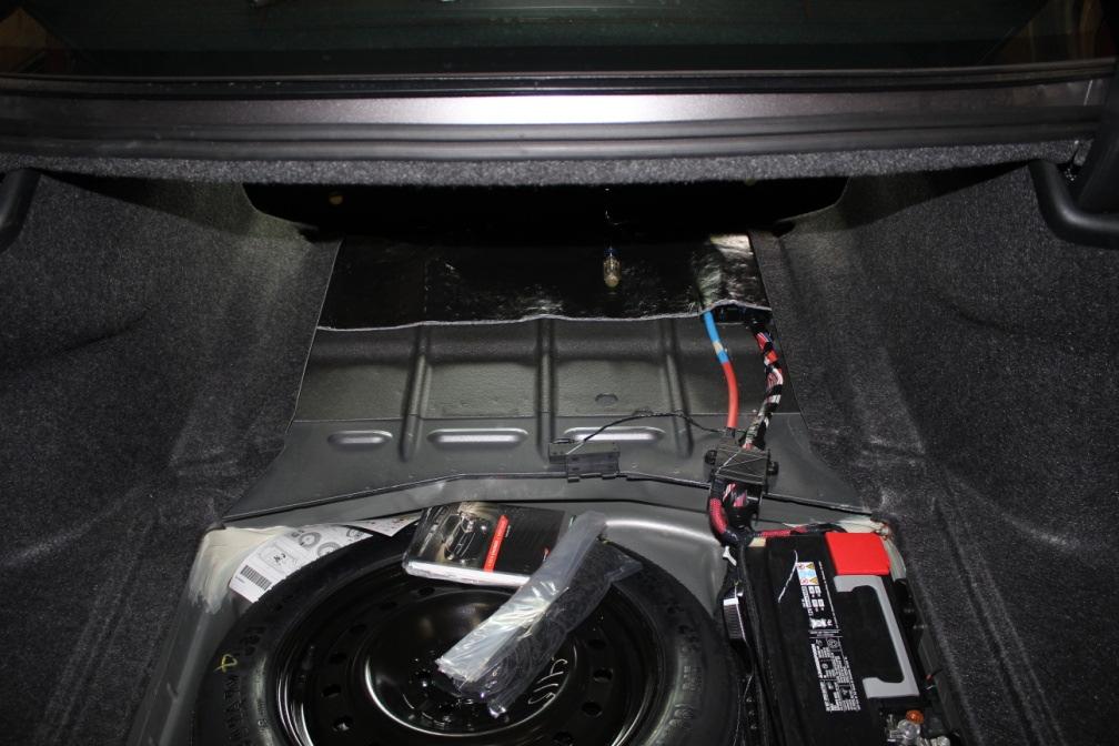 PICTURE 3 4) With the flap pulled, it is recommended to remove the trunk flooring at this time. See picture 4.
