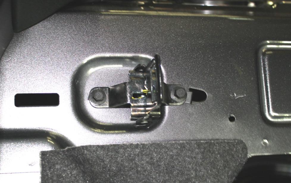 11) Remove the seat back latches using a 10mm socket. Repeat for the other side also. Picture 11.