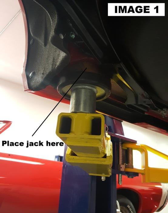 NOTE: While this installation can be done with a hydraulic jack and jack stands, it is most easily performed with a 2-post service lift, transmission jack, and a few extra people.
