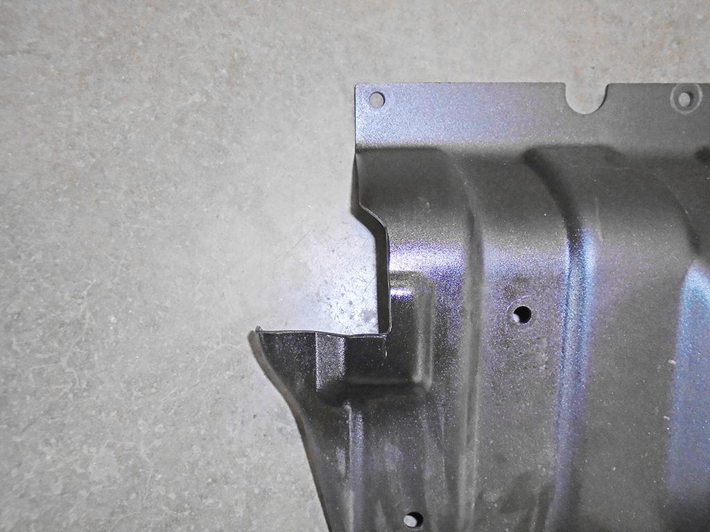E If you have a Winter Edition model or any other model with a bumper like the one shown in Figure E: trim the skid plate as shown in Figure F.