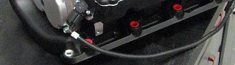 Use a 13mm socket to attach the harness power wire to the main positive terminal. 148.