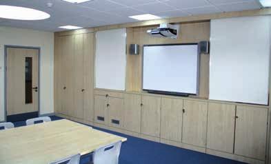 storage and incorporating an optional interactive whiteboard or drywipe boards into one convenient area, allowing walls to be