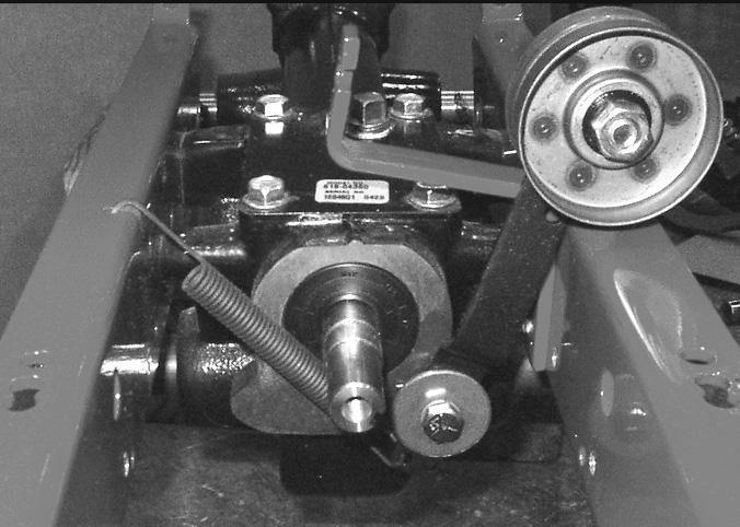 29. Unhook the forward drive idler extension spring from the RH frame. See Figure 10. 30.