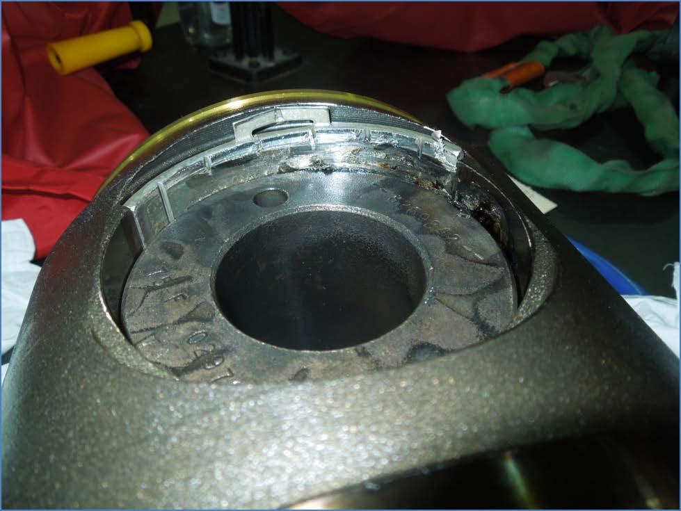 Figure 4: Silver wrist pin bearing was damaged. The plant conducted a root cause analysis in coordination with the equipment manufacturer.