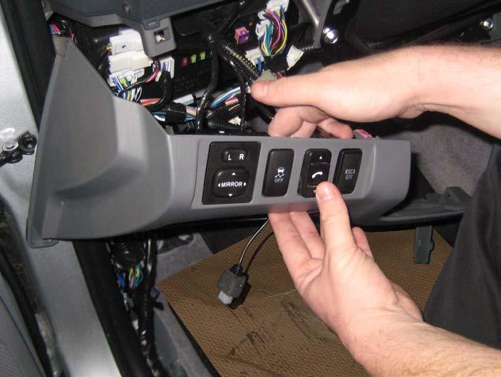 BLU Logic Switch Installation - Option II USE ONLY IF OPTION I IS NOT AVAIL- ABLE. a. Remove center console subassembly. 1. Remove the shift knob (Fig. 1-24). 2.