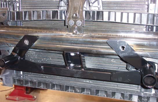 If you experience difficulty in drilling due to the hard composition of the bumper core, drill a pilot hole first.